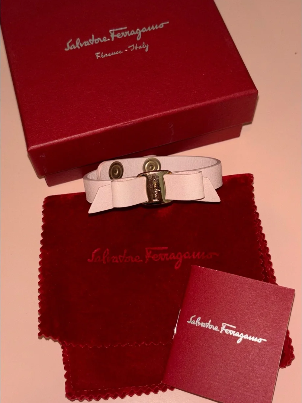 Salvatore Ferragamo Pale Pink Leather Vara Bow Bracelet with Gold Hardware